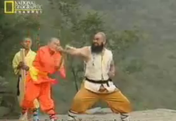 Shaolin Monk Breaks Staff with Arm